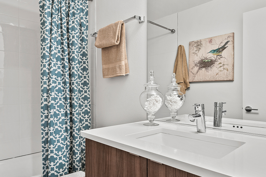 bathroom interior with shower and tub