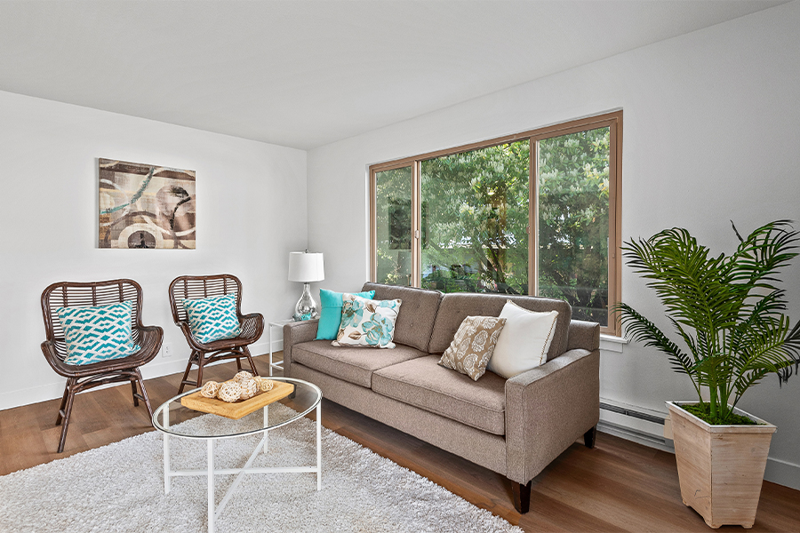 living room interior with lush Magnolia, Seattle views